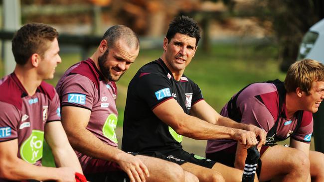 Manly Coach Trent Barrett with Matt Parcell, Nate Myles and Jake Trbojevic at Sea Eagles training. Picture: Braden Fastier