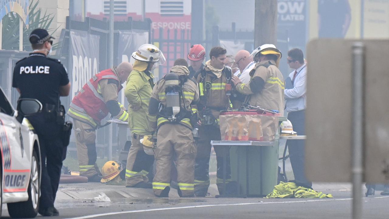 Firefighters at the scene of the large factory fire in Slacks Creek, south of Brisbane, where Izzy Nash died. Picture: Dan Peled / NCA NewsWire