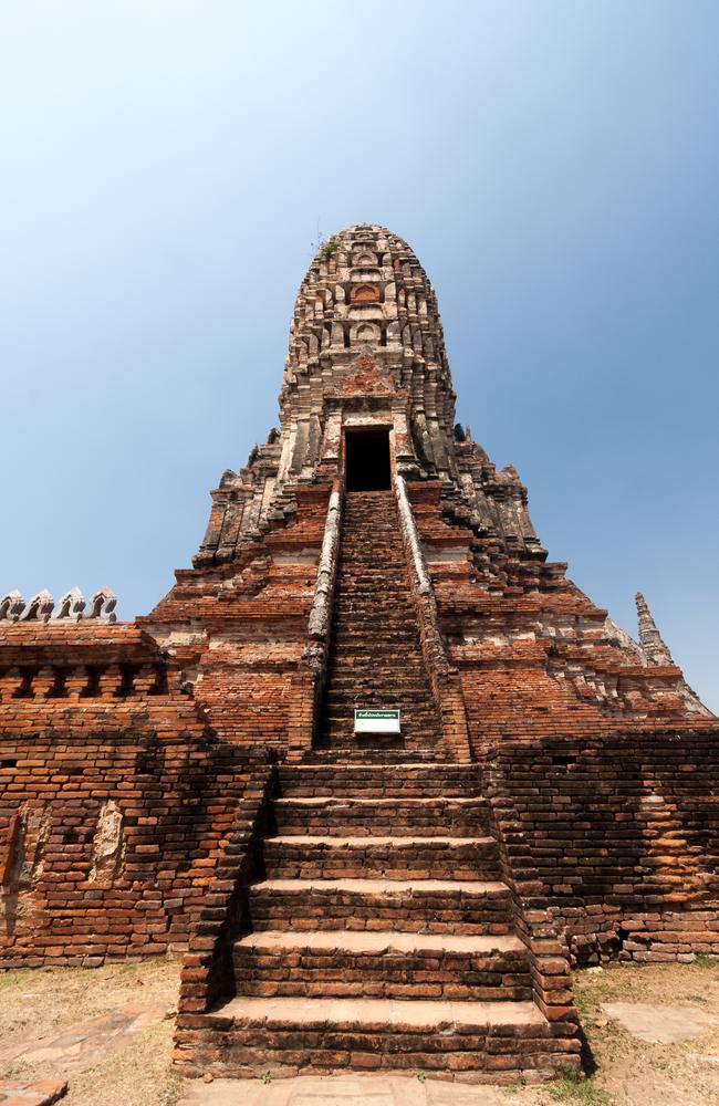 Ancient pagoda on Chaiwatthanaram Temple in Ayutthaya historical park, Thailand.