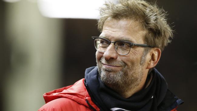 Liverpool's manager Juergen Klopp smiles before the English Premier League soccer match between Liverpool and Manchester City at Anfield Stadium, Liverpool, England, Wednesday, March 2, 2016. (AP Photo/Jon Super)