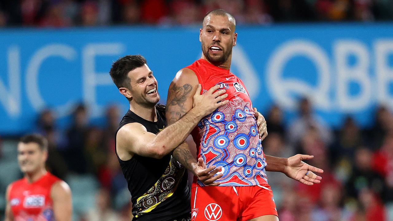 Sydney's Lance Franklin and Richmond's Trent Cotchin clash at the SCG. Picture: Phil Hillyard