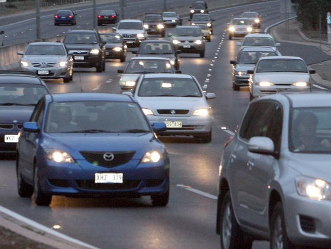 View from tollgate of car traffic coming down the South Eastern Freeway road at the end of the long weekend in Adelaide.