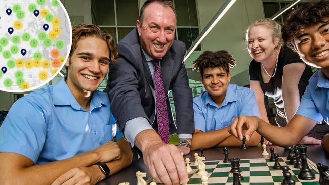 Moreton Bay Boys’ College has one of the best teacher-student ratios in the state. Moreton Bay Boys College Year 12s Lachlan Hume, Rami Mfinanga and Vinney Poral with Principal Andrew Holmes and Naomi Williams. Picture: NIGEL HALLETT