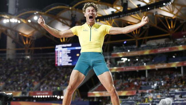 Kurtis Marschall celebrates in the athletics men's pole vault final. Picture: Adrian Dennis.