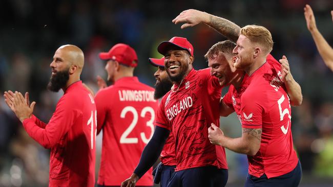 Chris Jordan of England celebrates with his teammates. Photo by Sarah Reed/Getty Images