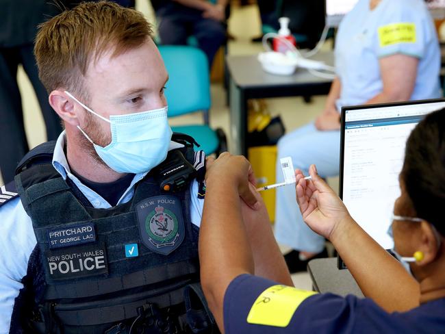 Frontline health and emergency workers were among the first in NSW to get the COVID-19 vaccination at the RPA vaccination hub. Picture: Toby Zerna