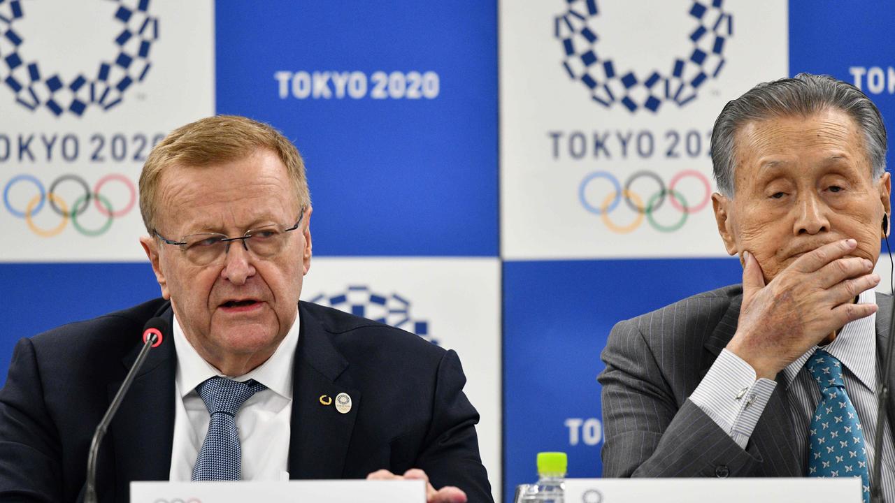 Chairman of the Tokyo 2020 Olympic Games co-ordination committee John Coates (L) and Tokyo 2020 president Yoshiro Mori (R) attend a press conference.