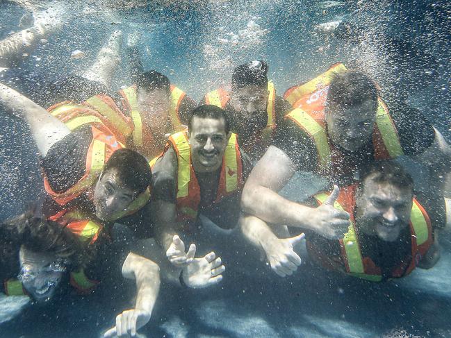 HOLD FOR SUNDAY HERALD SUN.  Melbourne's first skypool is making a splash, seven stories above the ground. The eye-catching water feature bridging the two Hawthorn Park apartment buildings. Construction workers cool off testing out the Skypool pool for the first time.    Picture: David Caird