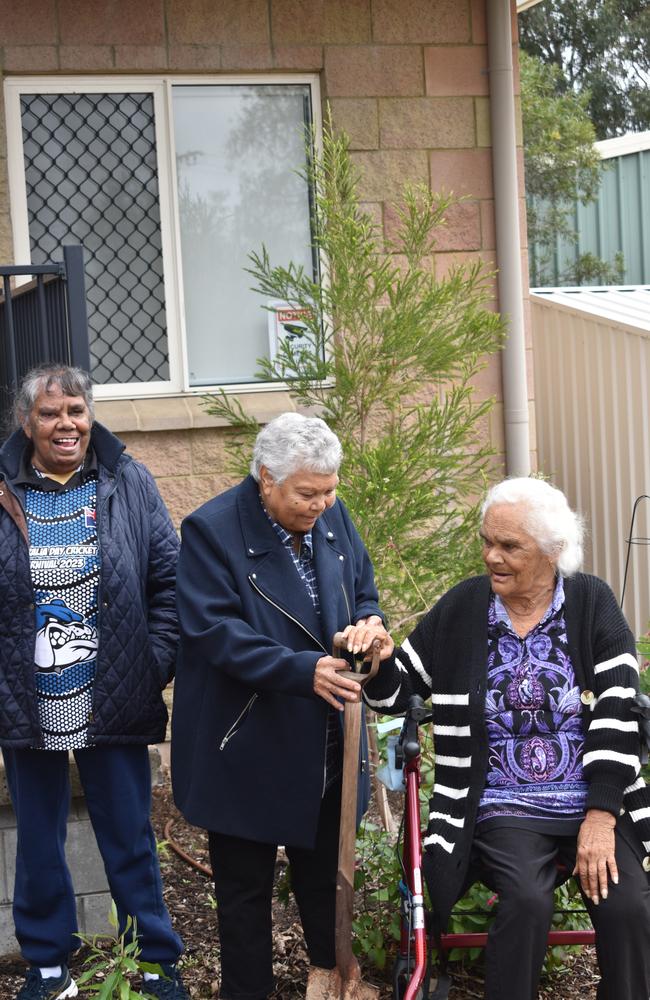 Elders June Speedy, Margaret Boney and Faye Hicks planting a lemon myrtle tree at NAIDOC Week, July 9, 2024.