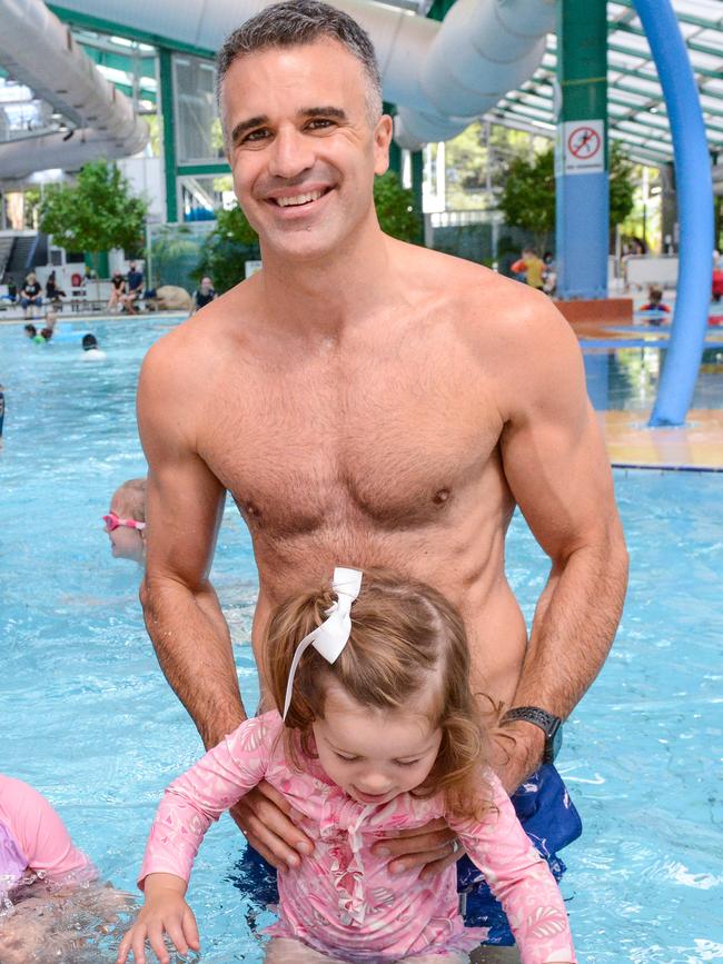 Then-opposition leader Peter Malinauskas with his daughter Eliza in a pre-election media stunt that made an immediate splash in his home state. Picture: Brenton Edwards