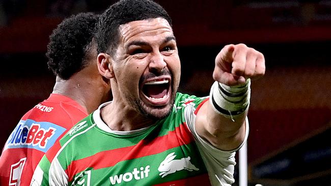 Cody Walker of the Rabbitohs celebrates scoring a try during the round seven NRL match between the Dolphins and South Sydney Rabbitohs at Suncorp Stadium on April 13, 2023 in Brisbane, Australia. (Photo by Bradley Kanaris/Getty Images)