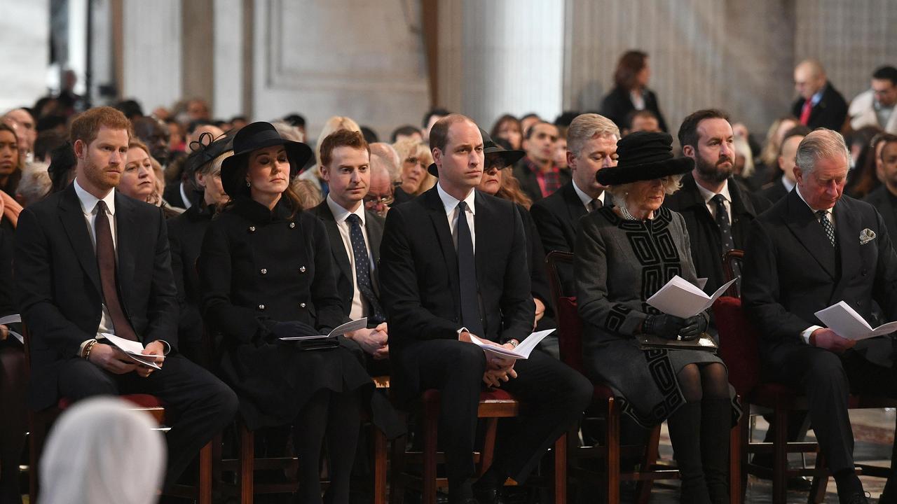 Prince Harry sat next to his brother and sister-in-law at the Grenfell Tower National Memorial service in 2017. Picture: Stefan Rousseau-WPA Pool Getty Images.