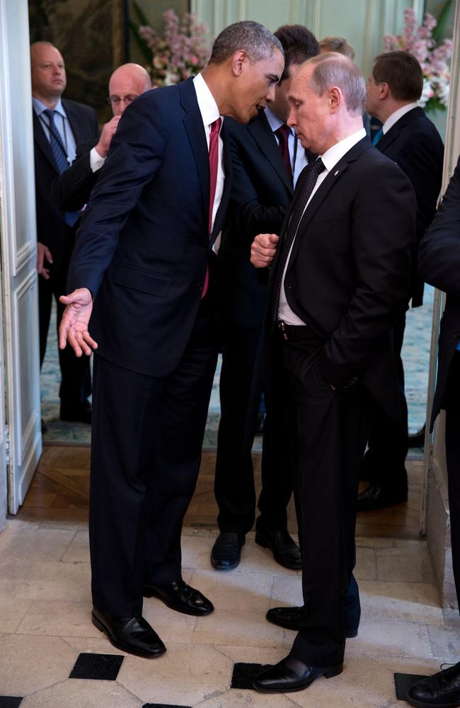“The President talks with Russian President Vladimir Putin after a lunch with other foreign leaders to commemorate the 70th anniversary of D-Day in Normandy, France on June 6, 2014. I’m sure they were talking about a subject matter other than D-Day.” Picture: Pete Souza/The White House
