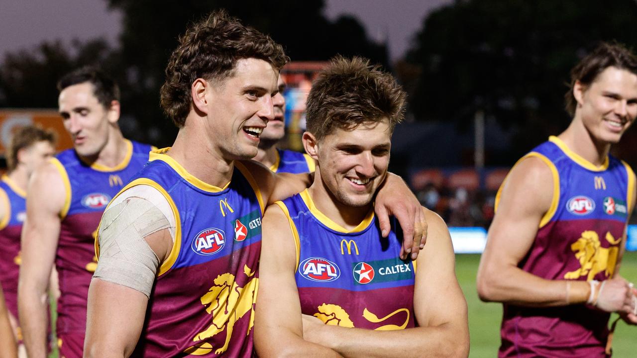 Brisbane players were all smiles after the Lions’ first win of the season over North Melbourne at Norwood Oval on Friday. Picture: Dylan Burns / Getty Images