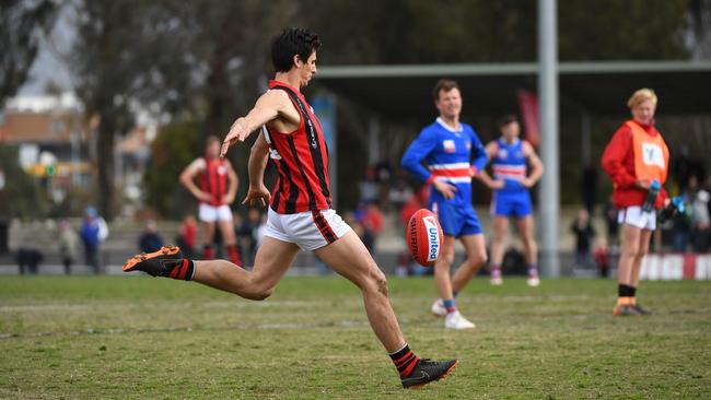 Jake Hammond has a shot at goal against South Croydon in this year’s preliminary final. Picture: James Ross/AAP