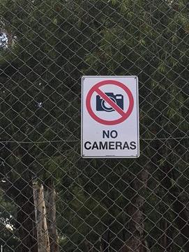 Blackburn Lake Primary School has a ‘no cameras’ sign on its fence.