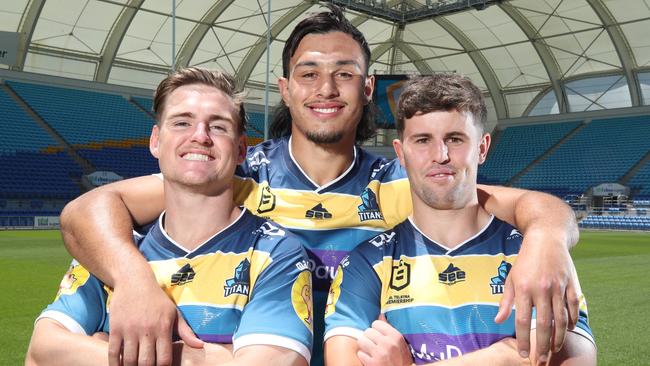 Titans stars AJ Brimson, Tino Fa'asuamaleaui and Toby Sexton modelled the new jerseys at Cbus Stadium. Picture: Glenn Hampson