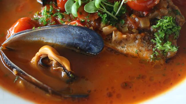 For TasWeekend. Flathead in South Hobart. Grilled Blue Eye Trevalla with Spring Bay Mussels, aqua pazza , baby basil and served with house bread.