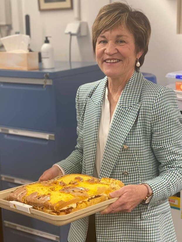 Helen Dalton shows her softer side with a sponge cake for staff.