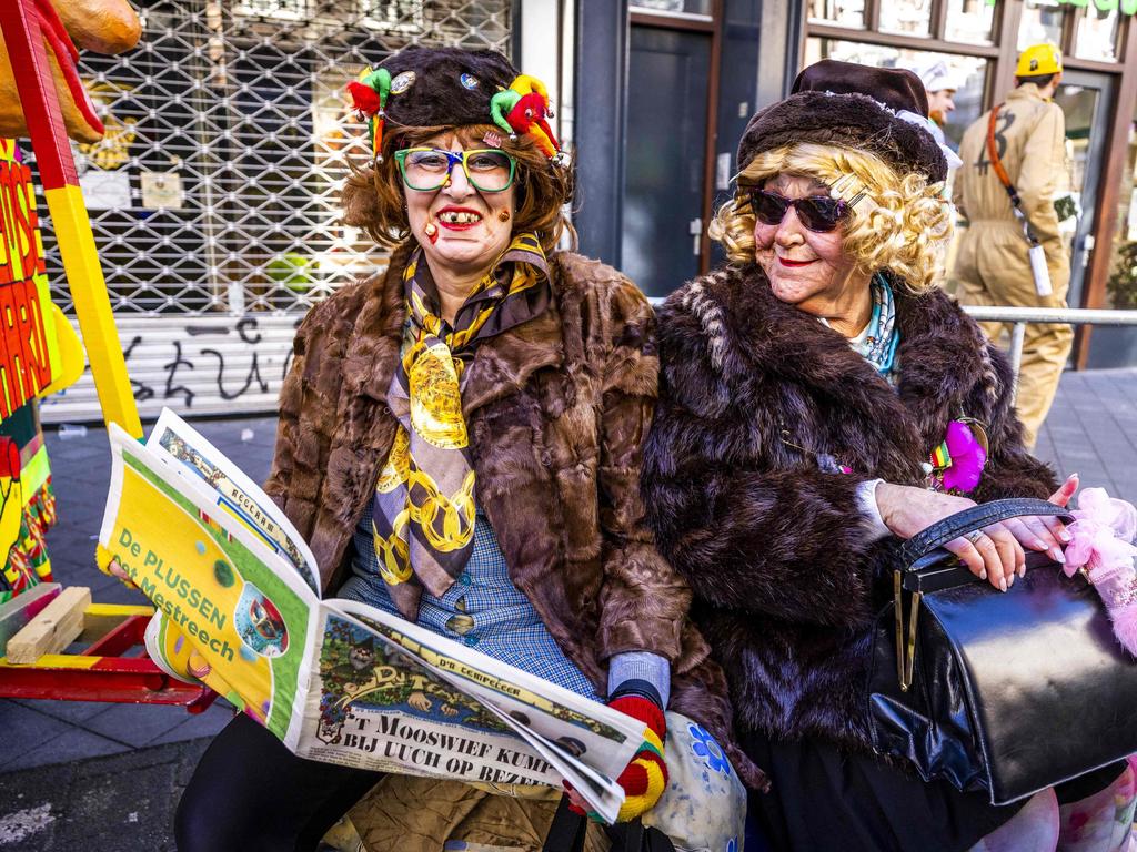 Carnival goers are dressed up during a carnival parade without floats before the advent of Ash Wednesday, the first day of Lent, in Maastricht. Picture: AFP / Netherlands OUT