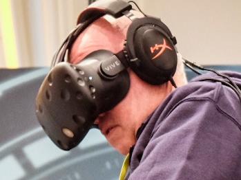 Chris Griffith tries out HTC Vive, a virtual reality headset at the CES tech show in Las Vegas