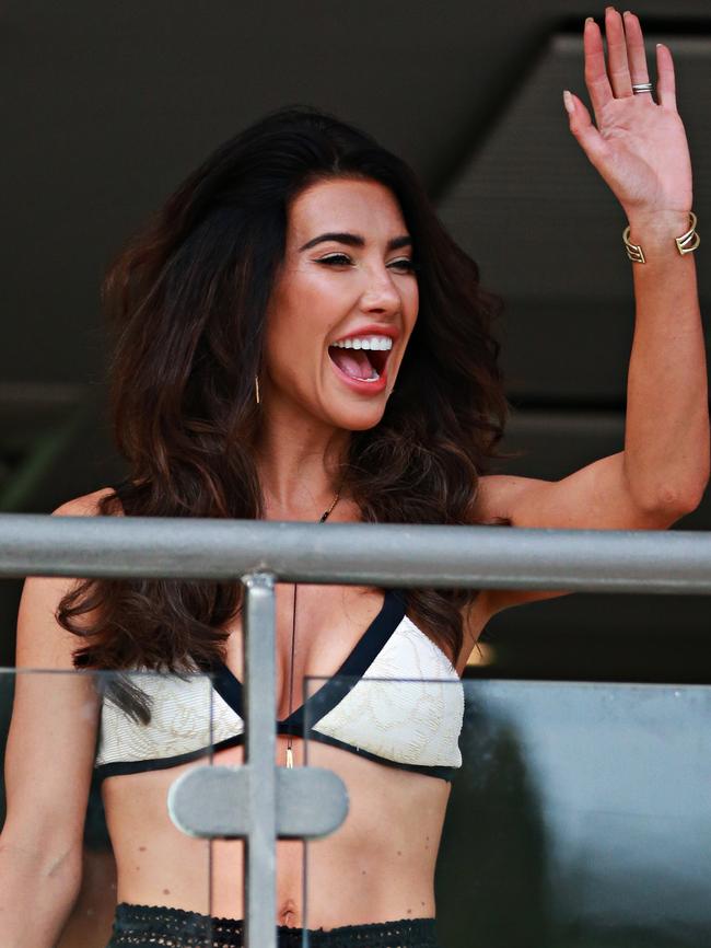 Jacqueline MacInnes Wood waving at fans before going on set on set at Shelly beach, Manly. Picture: Adam Yip/ The Manly Daily