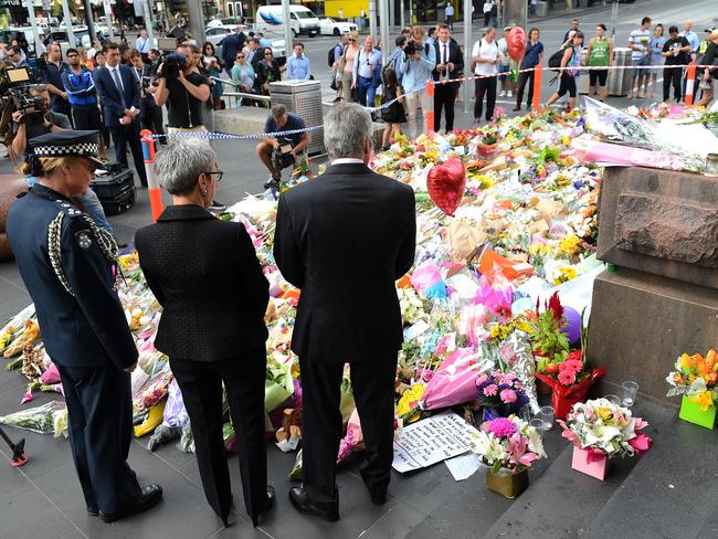 Governor Linda Dessau pays her respects this morning. Picture: Nicole Garmston