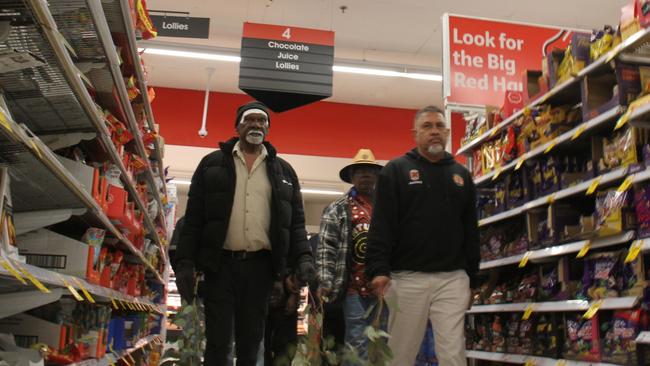 Robin Granites, the grandfather of a 24-year-old man from Yuendumu walks through aisle four in Coles Alice Springs during a vigil for the young man. The young man died in custody inside the supermarket on May 27, 2025, in aisle four, the lolly aisle. Picture: Gera Kazkov