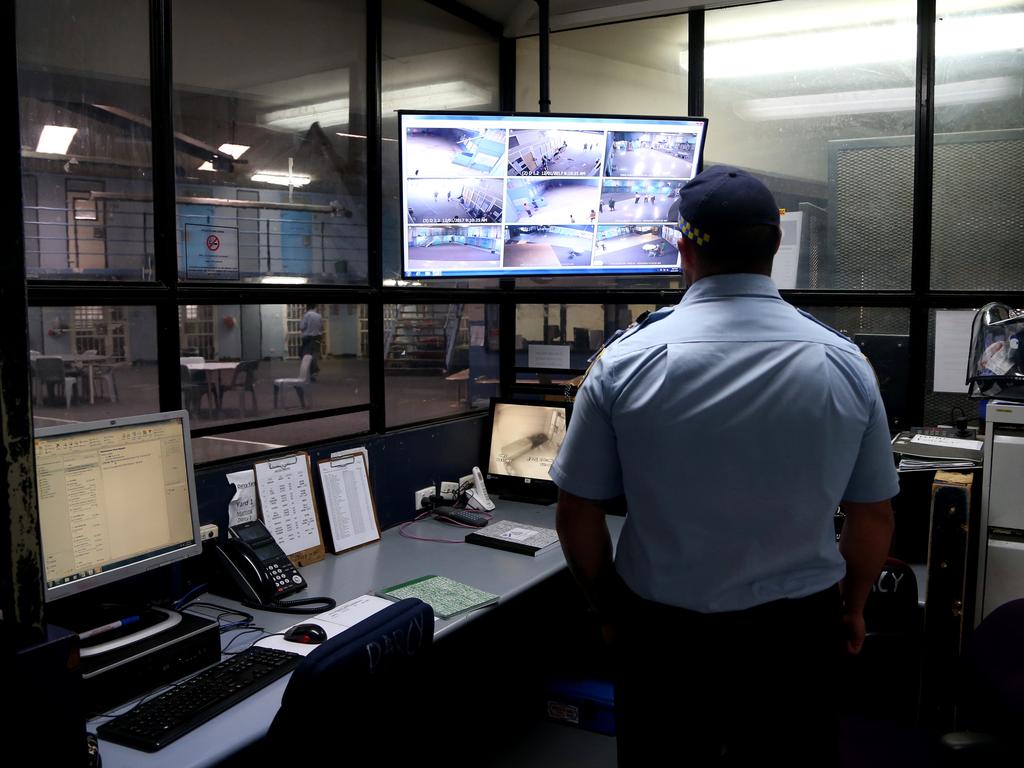 A NSW Corrective Service officer keeps an eye on Darcy 1 compound in D Block. Picture: Adam Taylor