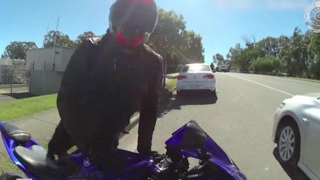 Motorcyclist allegedly found breaching restrictions and in possession of drugs. Picture: Queensland Police Service