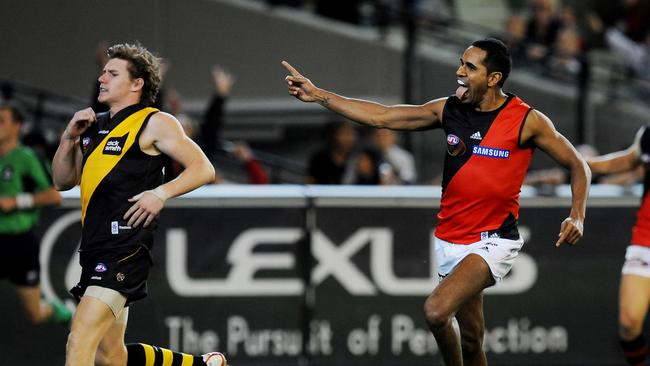 Andrew Lovett celebrates kicking a goal for Essendon against Richmond in 2009. Lovett has quit Sorrento after playing five games with the Sharks this season.