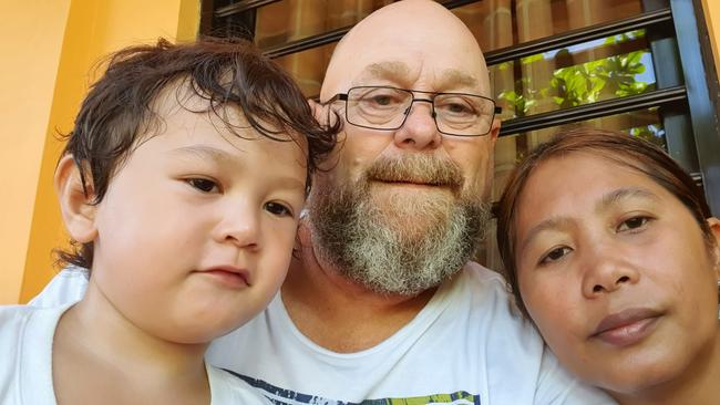 Hobart man Brett Riseley with wife Imelda and three-year-old son Tasman. They are stuck in the Philippines and unable to return to Tasmania because of coronavirus restrictions.