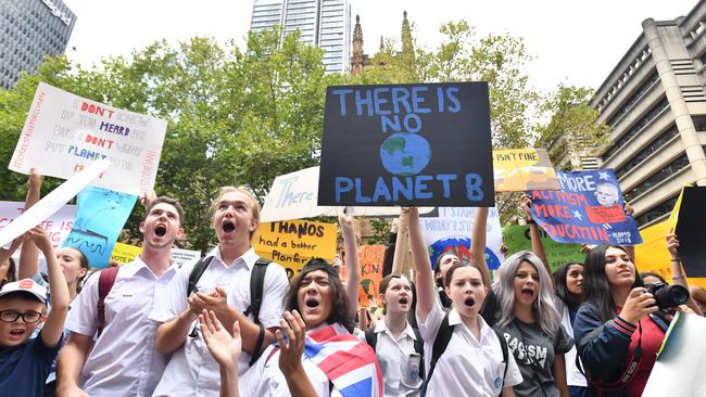 Thousands of school students from across Sydney attend the global #ClimateStrike rally at Town Hall in Sydney today. Picture: AAP