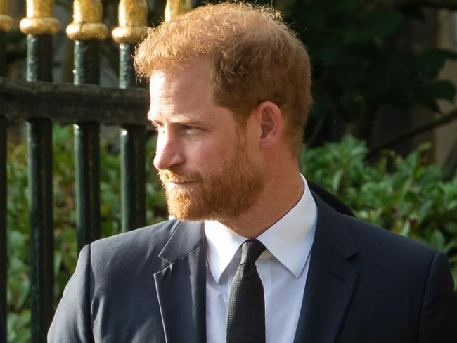 Prince William, the new Prince of Wales, and Prince Harry, the Duke of Sussex, arrive to view floral tributes to Queen Elizabeth II laid outside Cambridge Gate at Windsor Castle on 10th September 2022 in Windsor, United Kingdom. Queen Elizabeth II, the UK's longest-serving monarch, died at Balmoral aged 96 on 8th September 2022 after a reign lasting 70 years. (photo by Mark Kerrison/In Pictures via Getty Images)