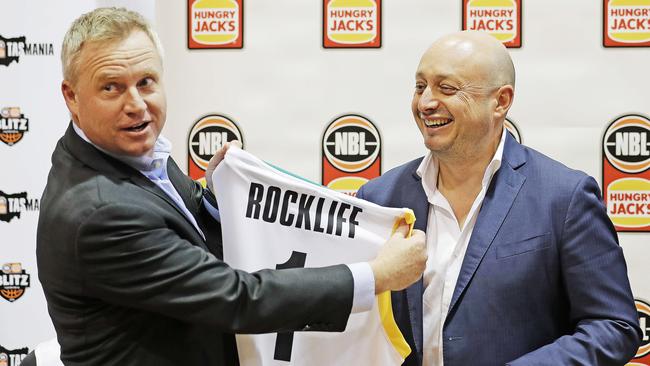 Recreation and Sport Minister Jeremy Rockliff, left, receives a jersey from NBL owner Larry Kestelman at the announcement the NBL Blitz would be heading to Tasmania. Picture: ZAK SIMMONDS