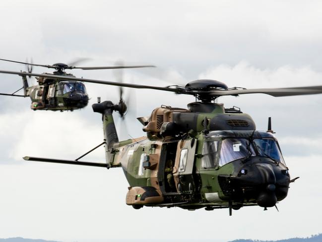 Australian Army MRH 90 Taipans from the 5th Aviation Regiment fly in formation deploying soldiers from the 3rd Brigade to Jungle Training Wing, Tully, Queensland during Exercise Kalimantan last year.