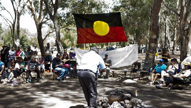 The tent embassy on Herrison Island welcomed guest speakers, Fred Hooper and Michael Anderson from the Canberra tent embassy. Pictured is Fred Hooper, as he rubs ash from a fire onto his face.