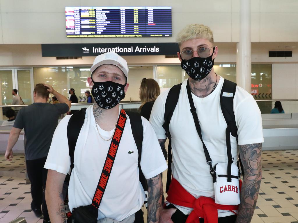 Brothers Dylan and Nick McCormick arrive back in Brisbane from Germany. Picture: Liam Kidston