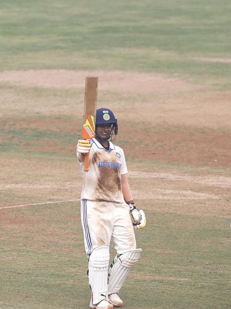 Deepti Sharma of India celebrates after bringing up her half century against Australia in Mumbai on Day 2 of the Test. Picture: Pankaj Nangia/Getty Images