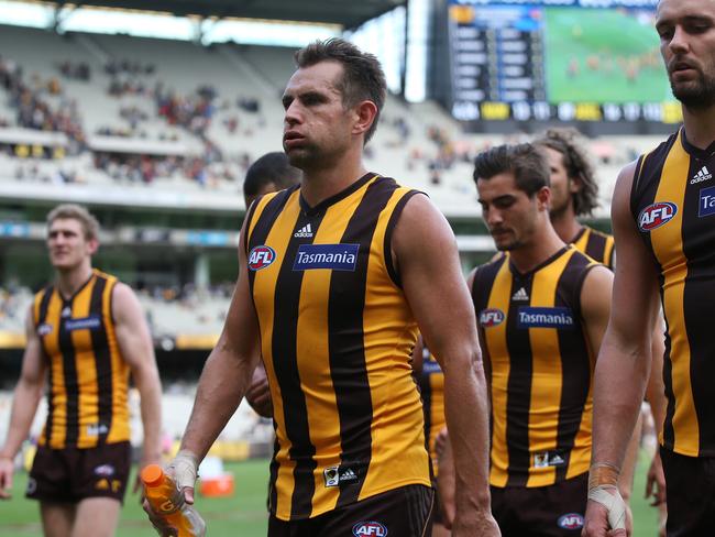 AFL Round 2. Hawthorn vs. Adelaide Crows at the MCG. Luke Hodge trudges off the MCG after losing to Adelaide. Pic: Michael Klein