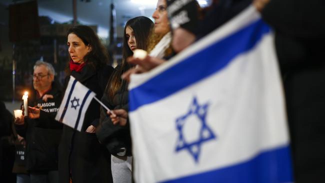 Jewish community members hold a vigil in memory of the those killed in Isreal by Hamas terrorists.