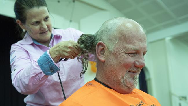 Fairholme College facilities manager Shane Tessmer has his head shaved as the school community raise over $95k for the Leukaemia Foundation in the World's Greatest Shave, Friday, May 24, 2024. Picture: Kevin Farmer