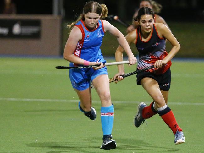 Saints' Talytha Macdonald (blue) is one of the most exciting prospects coming through the Cairns Hockey ranks. Picture: Brendan Radke