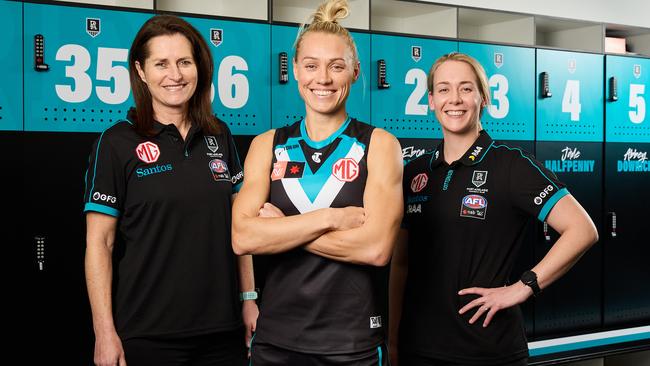 Port Adelaide AFLW boss Juliet Haslam with Phillips and coach Lauren Arnell. Picture: MATT LOXTON