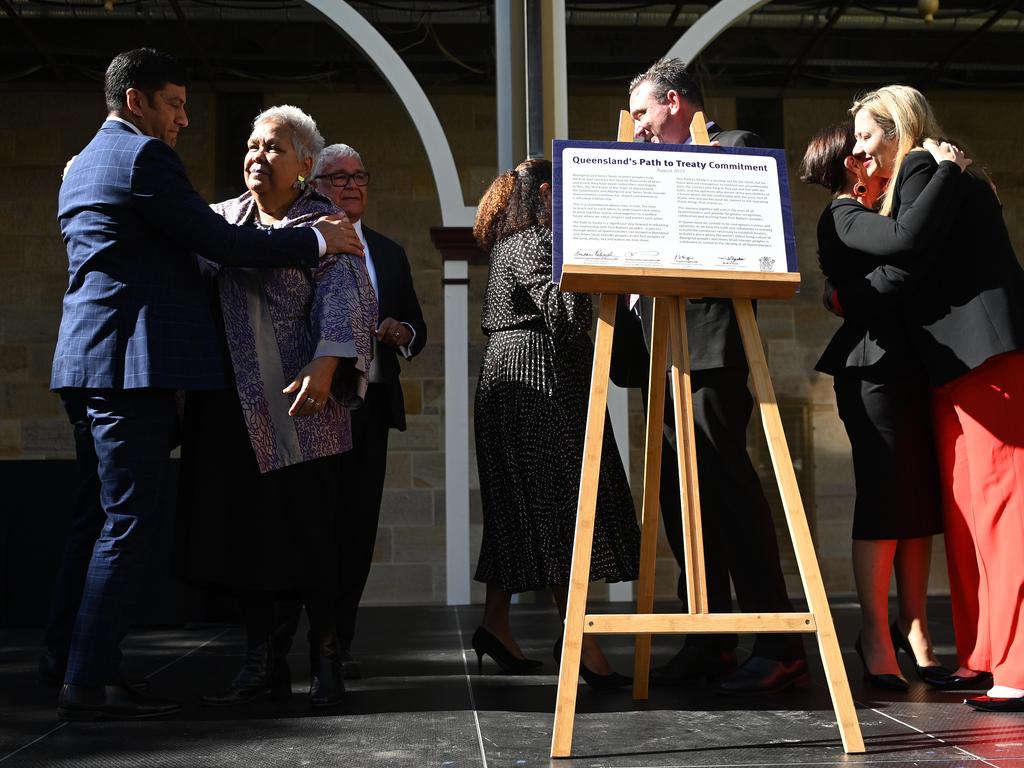 Queensland Premier Annastacia Palaszczuk hugs Leeanne Enoch after signing the Statement of Commitment to the Path to Treaty. Picture: NCA NewsWire / Dan Peled