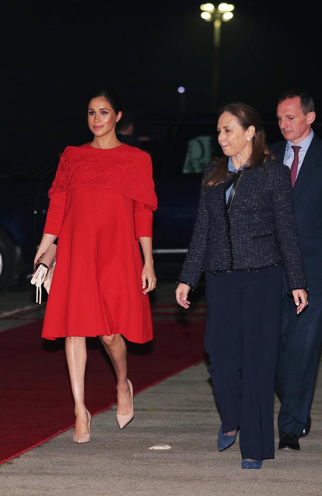 Meghan, Duchess of Sussex is welcomed by British Ambassador to Morocco Thomas Reilly and his wife Alix Reilly as she arrives at Casablanca Airport. Picture: Getty