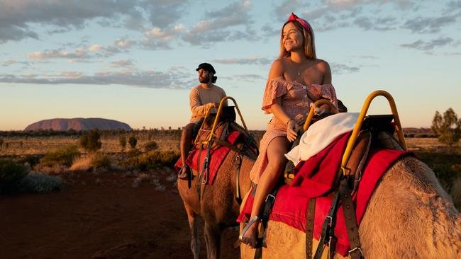 The multimillion-dollar Territory tourism voucher scheme will be extended for two more rounds, in a move to encourage Territorians to explore spots in their own backyard such as Uluru. Picture: Tourism NT/Matt Cherubino