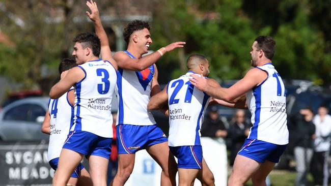 Ahmed Saad celebrates a goal with West Preston-Lakeside teammates. Picture: Steve Tanner