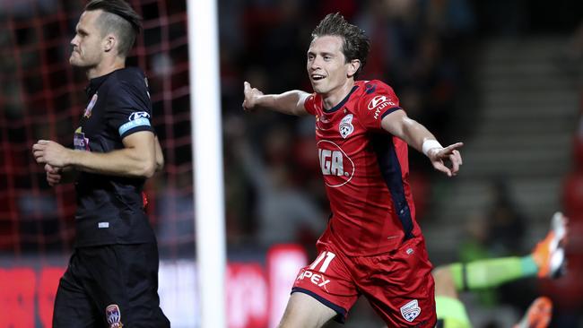 Adelaide’s Craig Goodwin celebrates after scoring the equaliser against Newacstle at Coopers Stadium. Picture: Sarah Reed