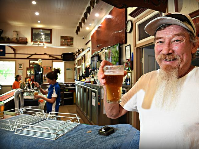 Last drinks (for a while) at the the Country Life Hotel, Kin Kin.Local resident Red Kensey enjoys a beer at his local  before the doors close at midday.